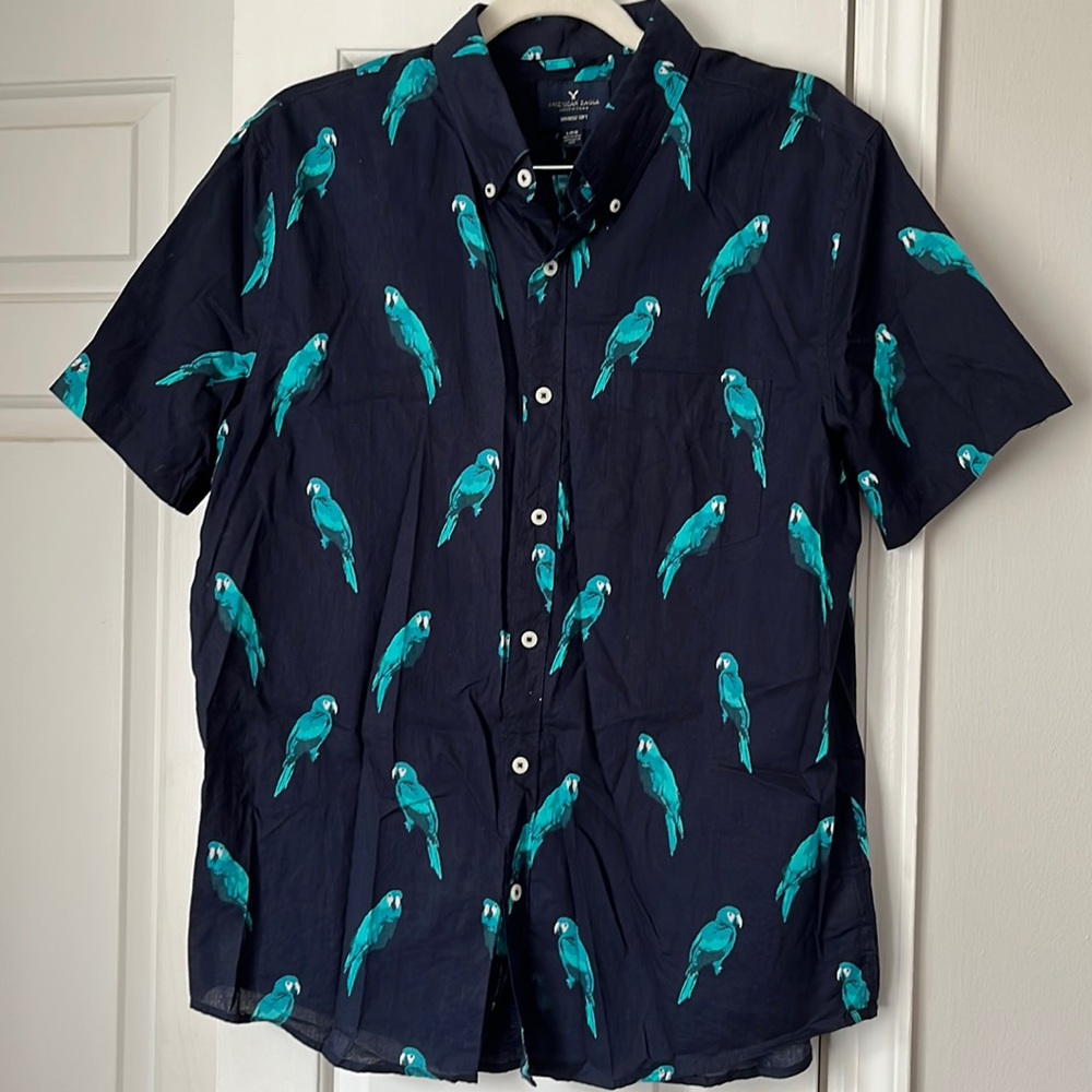 Navy blue button down shirt with parrots